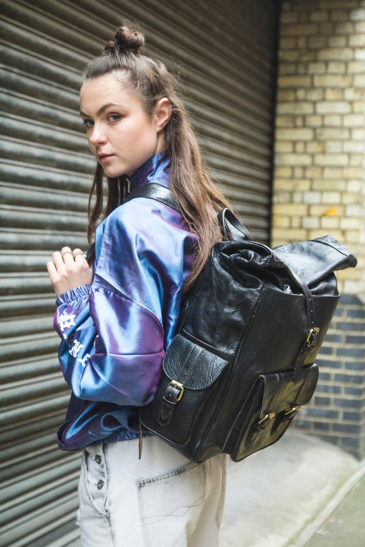 Roll Top Black Leather Rucksack With Padded Quilted Back
