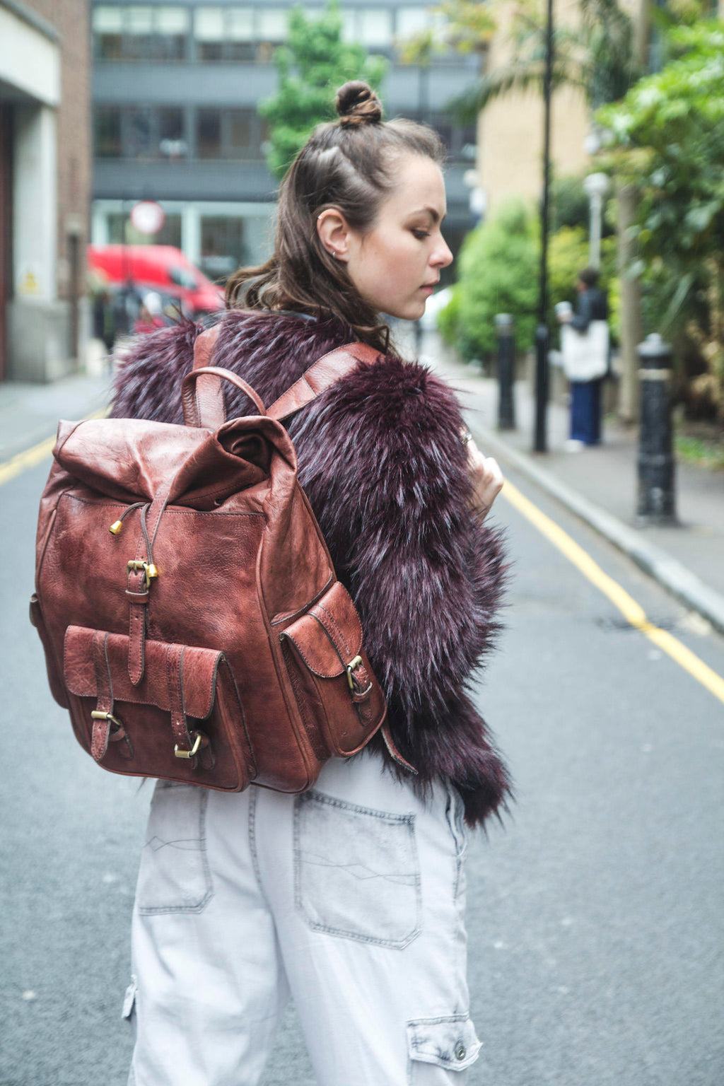 Leather Rucksack With Roll Top And Soft Quilted Back In Brown