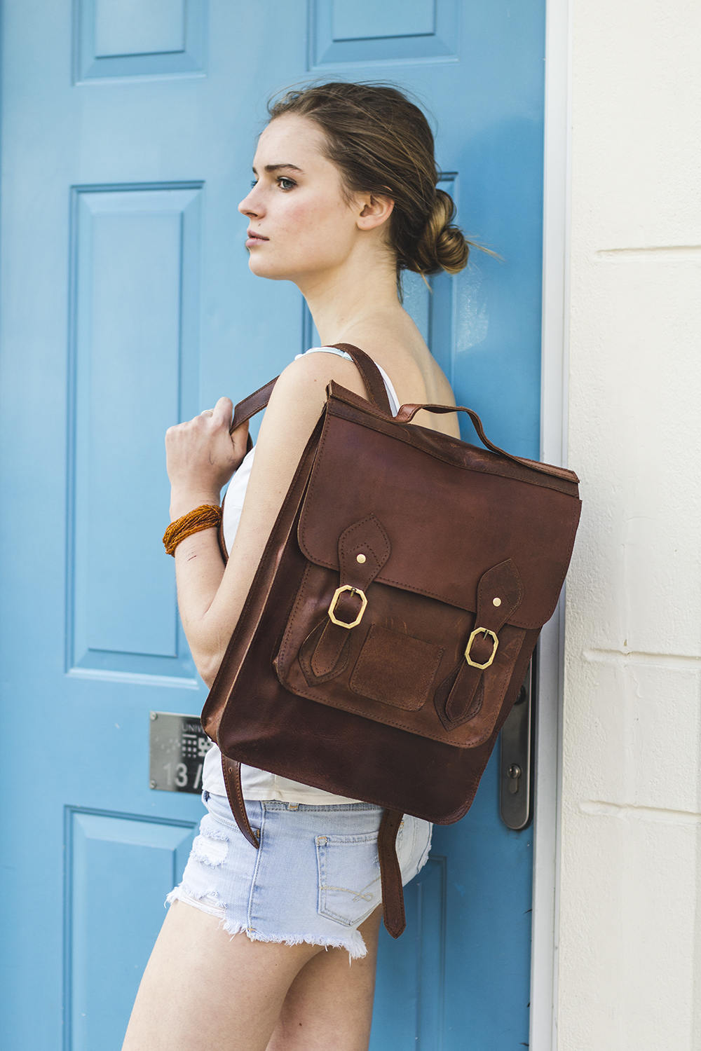 Leather Backpack In Brown With Flap And Buckles