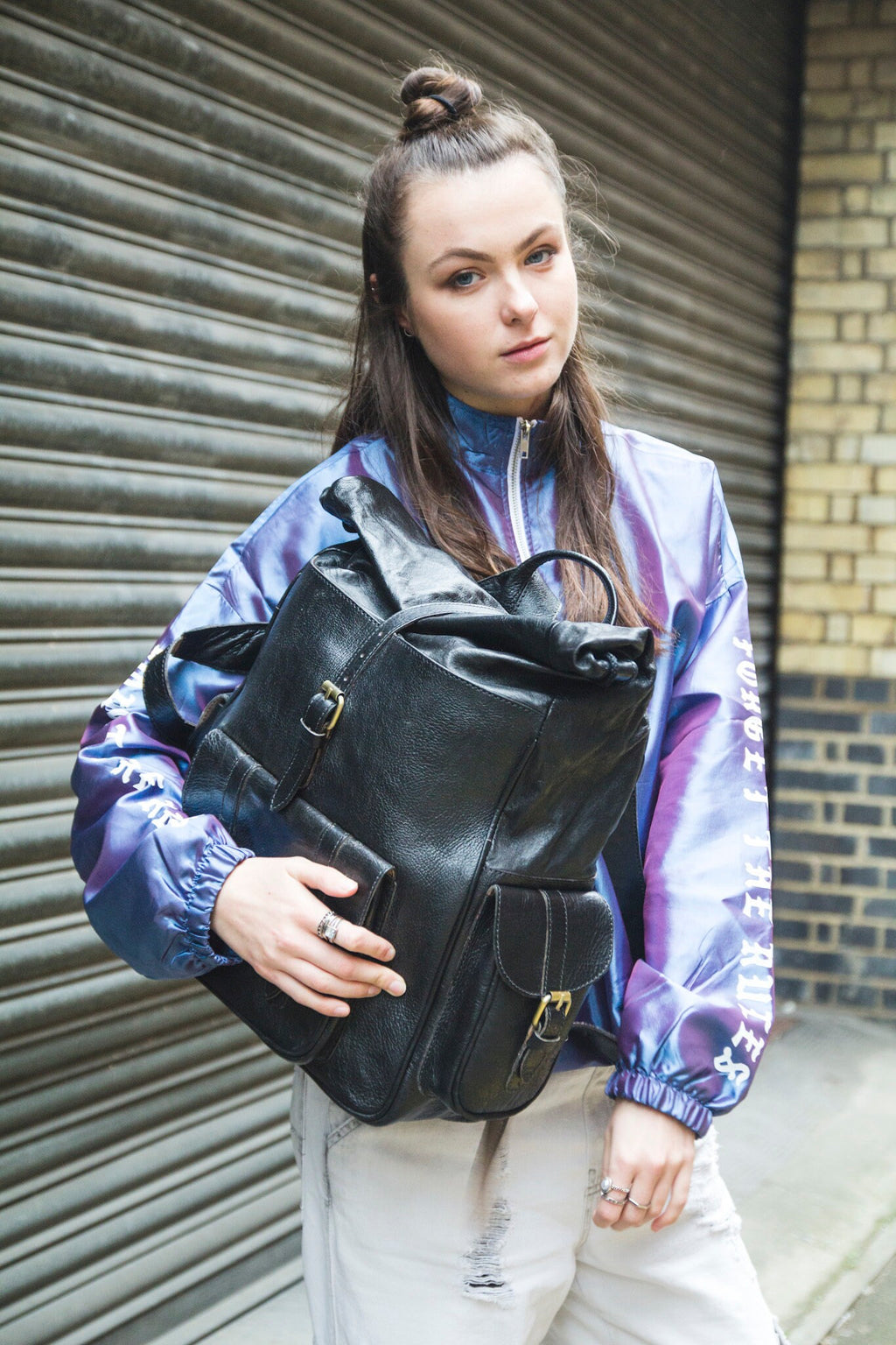 Roll Top Black Leather Rucksack With Padded Quilted Back