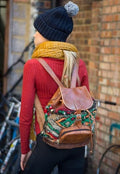 Bohemian Kilim Carpet and Moroccan Leather Rucksack