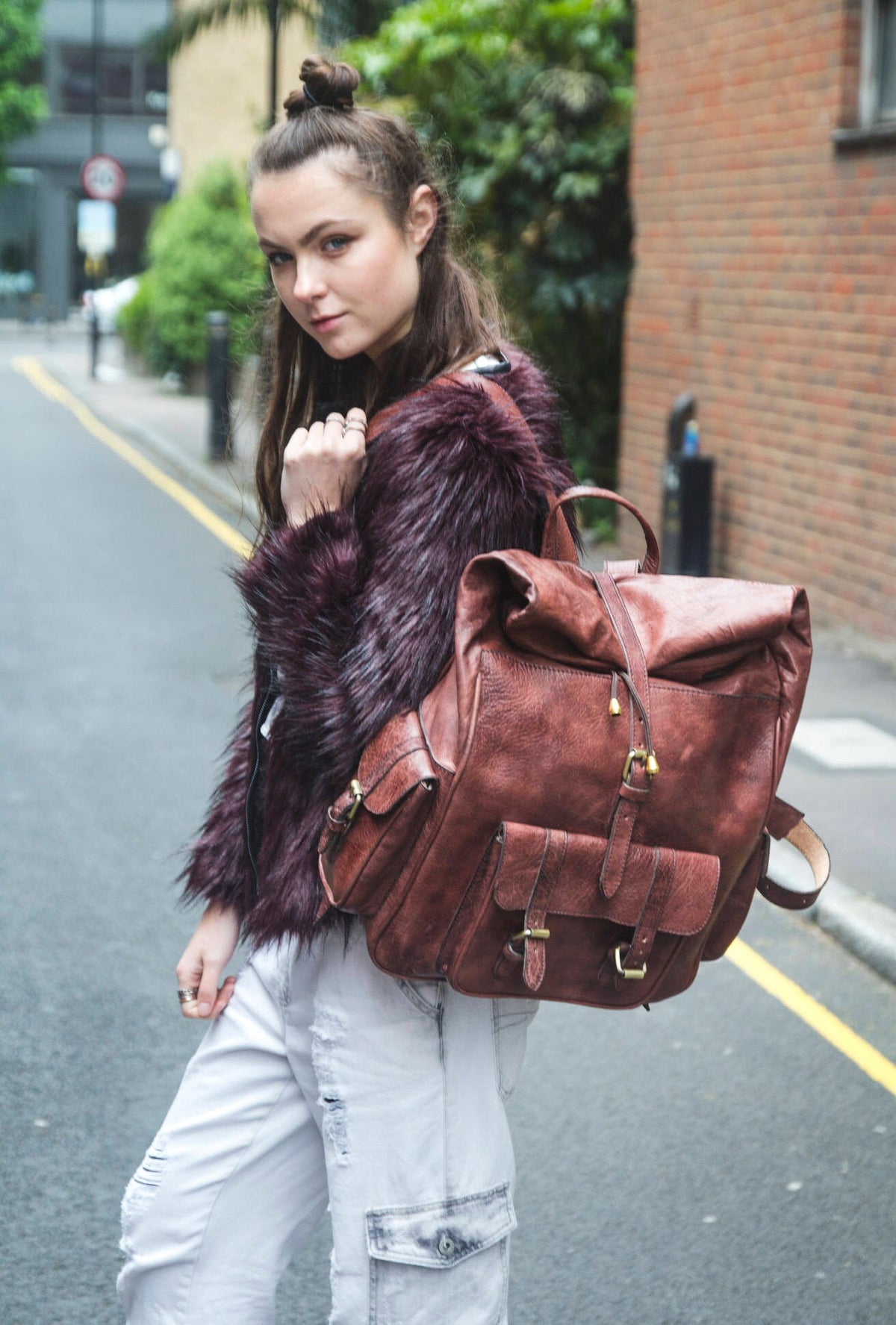 Leather Rucksack With Roll Top And Soft Quilted Back In Brown