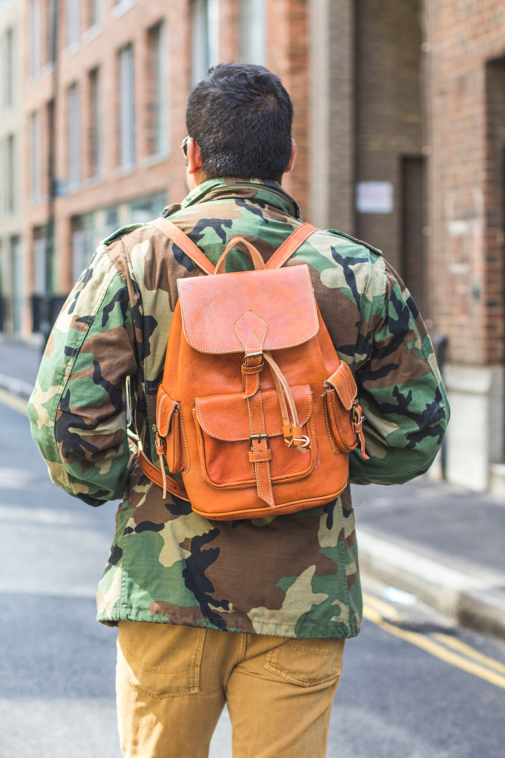 Hand Made Leather Rucksack In Orange Tan